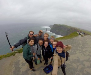 studnt pose for selfie at cliffs of moher
